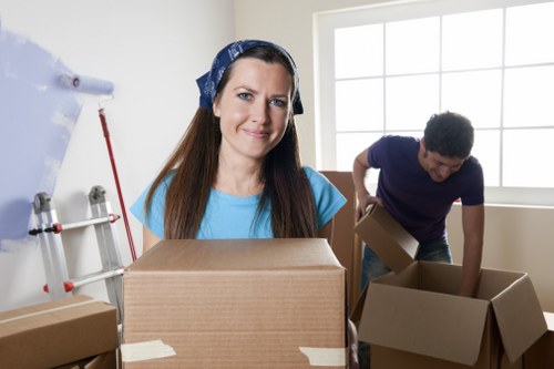 Professional removals crew maintaining safety during a move