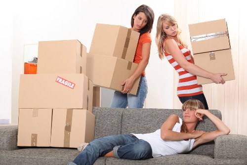 Local movers transporting household items across an Italian city